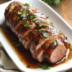 Apricot Glazed Bacon Wrapped Cajun Pork Tenderloin