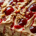 Peanut Butter and Jelly Poke Cake